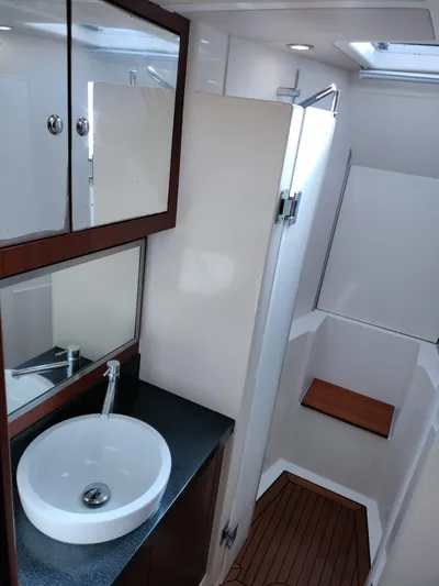 Felitsata II Yacht Photos Pics Modern bathroom in 2011 Moody 62 DS yacht with sleek sink and shower.