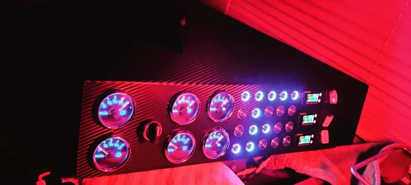 Felitsata II Yacht Photos Pics Control panel with illuminated gauges and switches on a 2011 Moody 62 DS yacht.