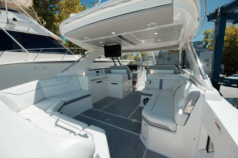  Yacht Photos Pics 2022 Regal LX36 boat interior with luxurious seating and modern amenities.