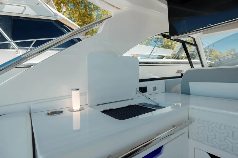  Yacht Photos Pics 2022 Regal LX36 yacht interior with sleek white design and modern amenities.