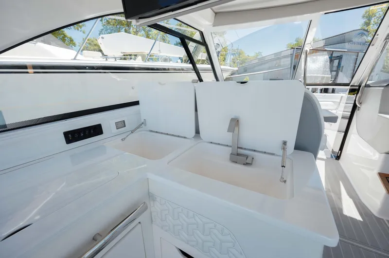  Yacht Photos Pics 2022 Regal LX36 yacht interior with modern sink and sleek design.