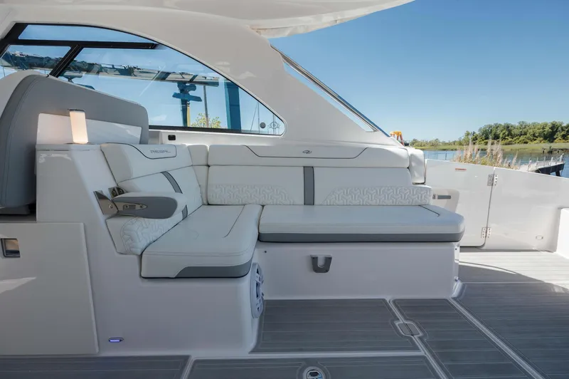  Yacht Photos Pics Luxurious interior of 2022 Regal LX36 boat with sleek seating and modern design.
