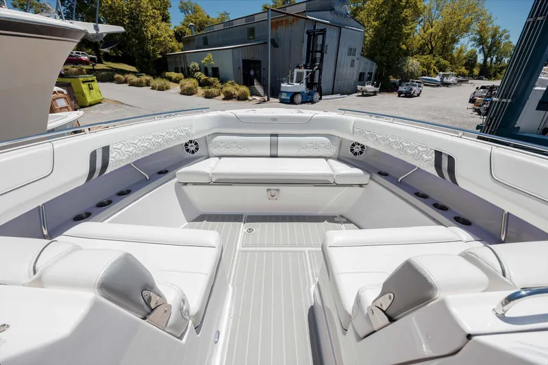  Yacht Photos Pics Luxurious 2022 Regal LX36 boat interior with white seating and modern design.