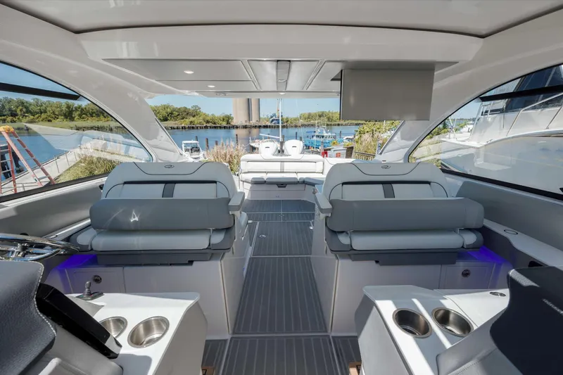  Yacht Photos Pics Luxurious 2022 Regal LX36 yacht interior with sleek seating and modern design.