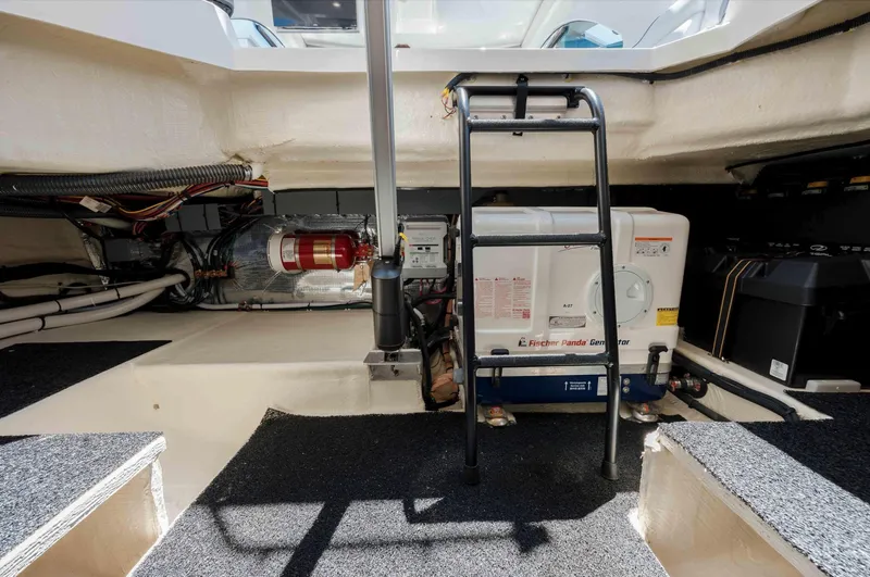  Yacht Photos Pics Engine room of 2022 Regal LX36 boat with generator and ladder.