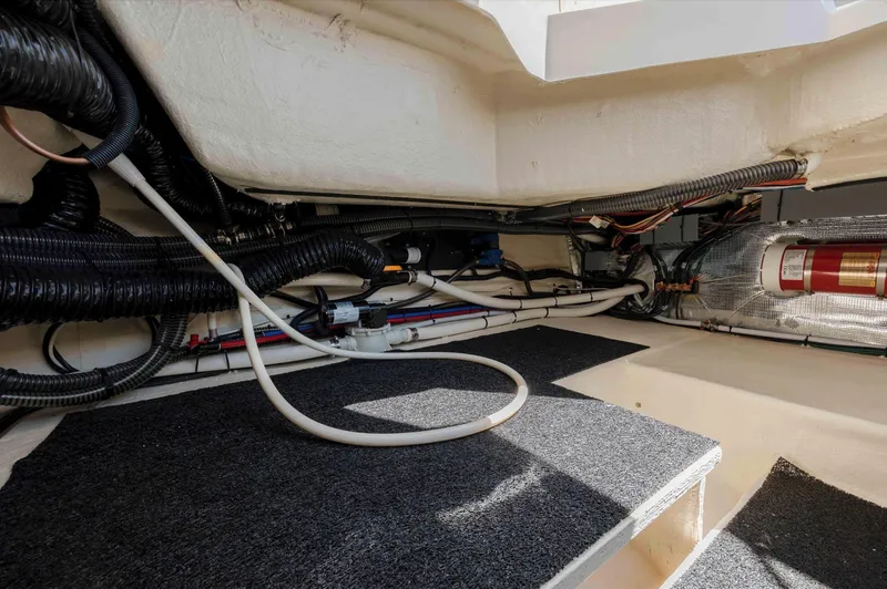  Yacht Photos Pics 2022 Regal LX36 engine compartment with wiring and fire extinguisher system.
