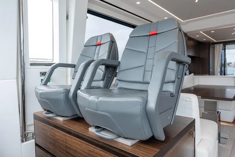  Yacht Photos Pics Luxury seating on 2024 Sunseeker Manhattan 68 yacht, featuring modern design and premium materials.