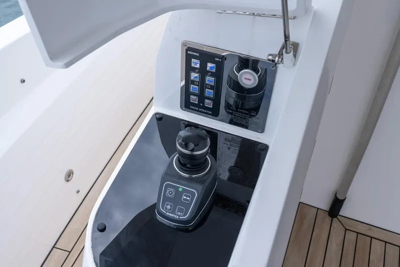 Yacht Photos Pics Control panel of 2024 Sunseeker Manhattan 68 yacht with joystick and display.