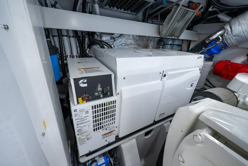  Yacht Photos Pics Engine room of 2024 Sunseeker Manhattan 68 yacht, featuring Cummins generator.