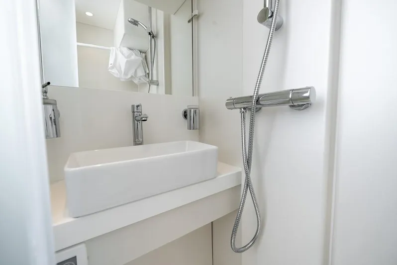  Yacht Photos Pics Modern bathroom in 2024 Sunseeker Manhattan 68 yacht with sleek fixtures.