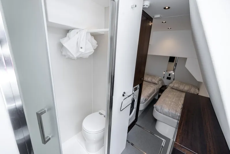  Yacht Photos Pics Luxurious bathroom and bedroom interior of 2024 Sunseeker Manhattan 68 yacht.
