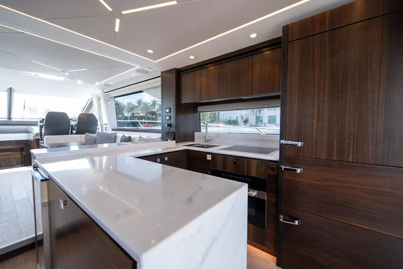  Yacht Photos Pics Luxurious kitchen interior of 2024 Sunseeker Manhattan 68 yacht with modern design.