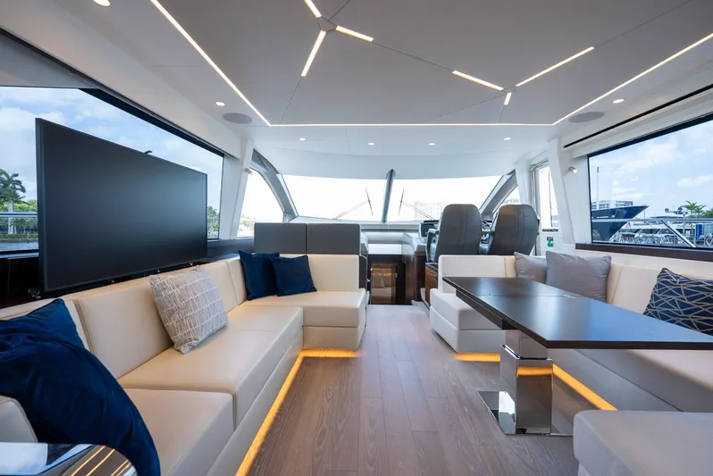  Yacht Photos Pics Luxurious interior of 2024 Sunseeker Manhattan 68 yacht with modern seating and sleek design.