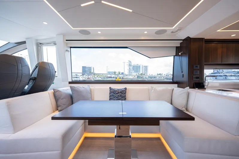  Yacht Photos Pics Luxurious interior of 2024 Sunseeker Manhattan 68 yacht with elegant seating and modern design.