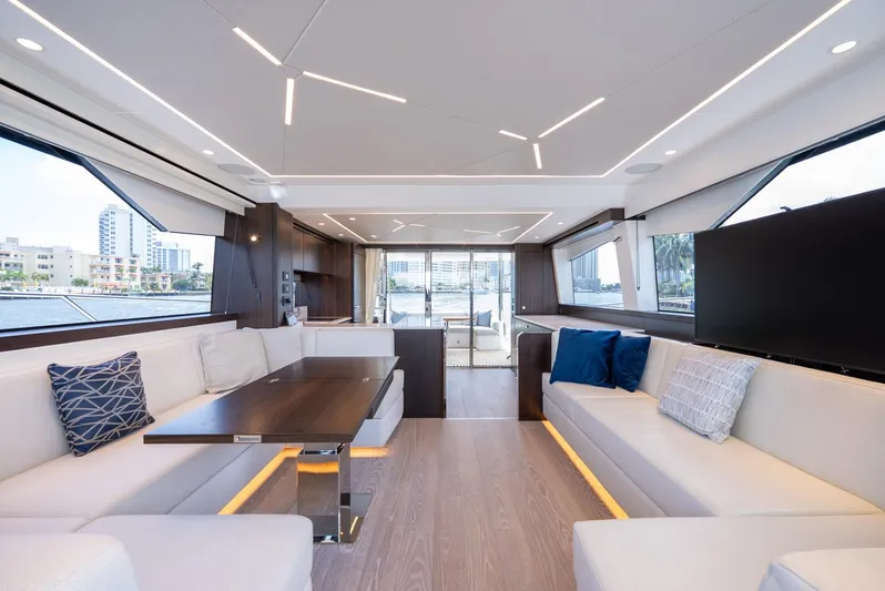  Yacht Photos Pics Luxurious interior of 2024 Sunseeker Manhattan 68 yacht with modern seating and elegant design.