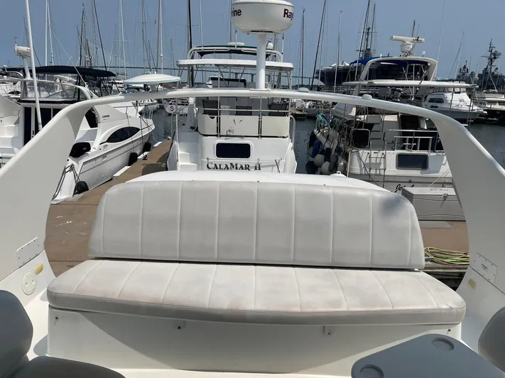 Andiamo Freedom Yacht Photos Pics 2006 Carver 36 Mariner yacht docked at marina, featuring spacious seating area.