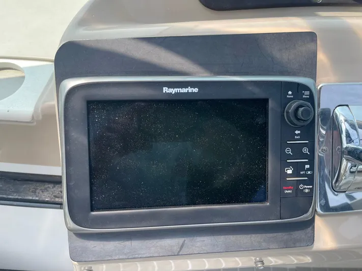 Andiamo Freedom Yacht Photos Pics Raymarine navigation system on a 2006 Carver 36 Mariner boat dashboard.