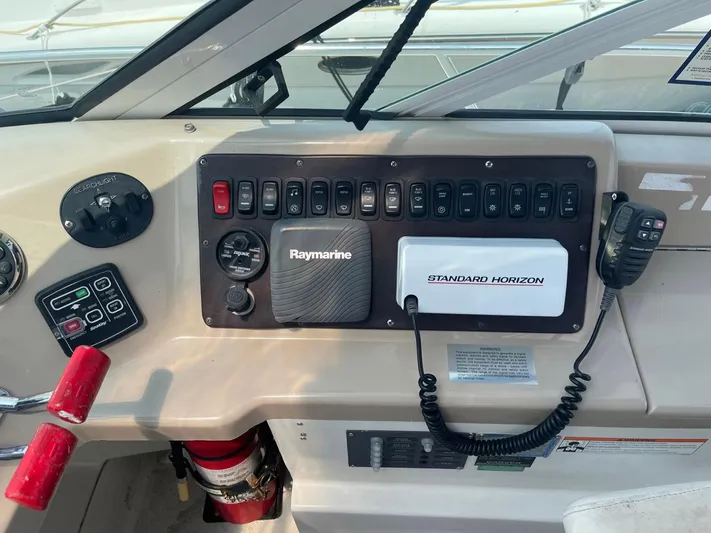 Andiamo Freedom Yacht Photos Pics Control panel of a 2006 Carver 36 Mariner with Raymarine and Standard Horizon equipment.