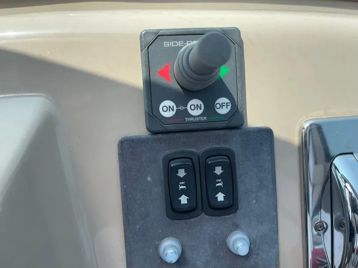 Andiamo Freedom Yacht Photos Pics Control panel of a 2006 Carver 36 Mariner boat with thruster joystick.