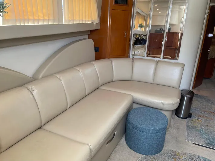 Andiamo Freedom Yacht Photos Pics Luxurious interior of 2006 Carver 36 Mariner yacht with beige leather seating.