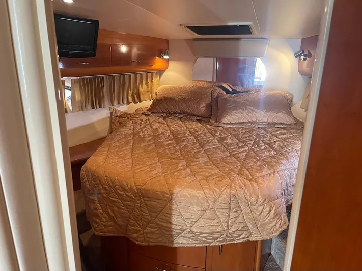 Andiamo Freedom Yacht Photos Pics Luxurious cabin interior of 2006 Carver 36 Mariner yacht with cozy bedding.