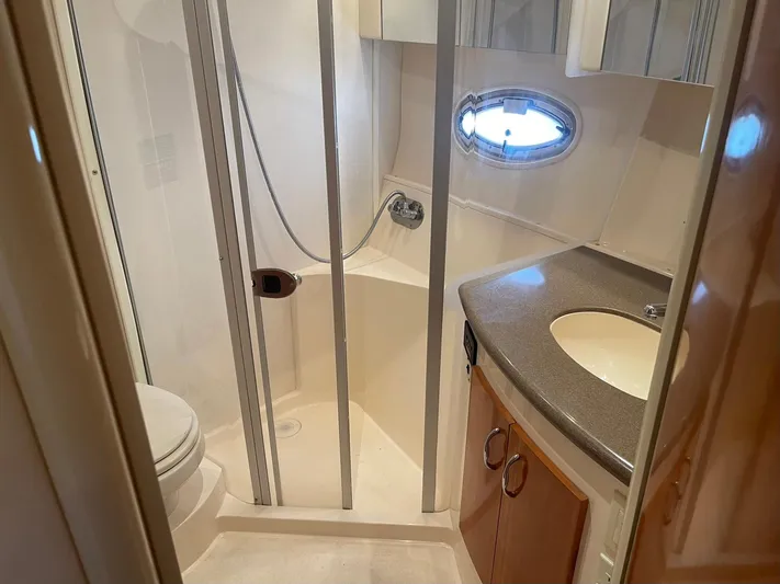 Andiamo Freedom Yacht Photos Pics Bathroom interior of 2006 Carver 36 Mariner yacht with shower and sink.