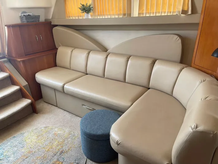 Andiamo Freedom Yacht Photos Pics Luxurious interior of 2006 Carver 36 Mariner yacht with beige leather seating.