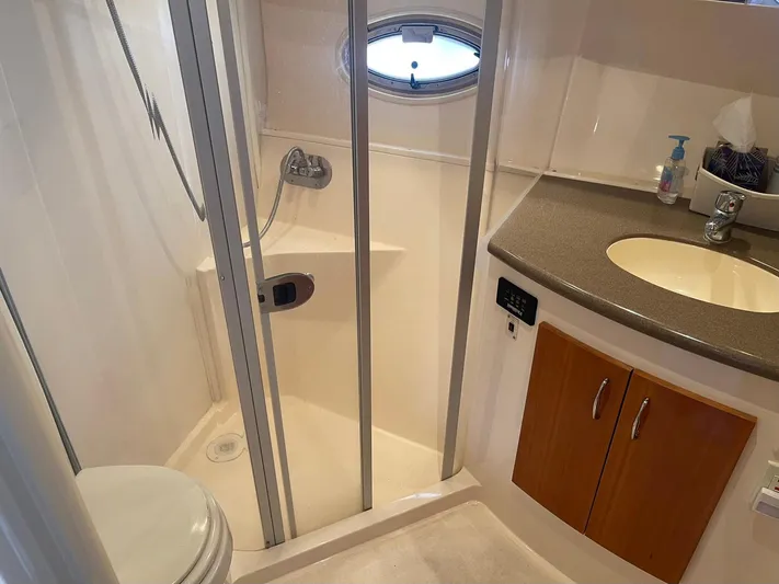 Andiamo Freedom Yacht Photos Pics Bathroom interior of 2006 Carver 36 Mariner yacht with shower and sink.