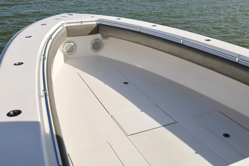  Yacht Photos Pics 2017 Contender 39 ST boat deck with speakers, on calm water.