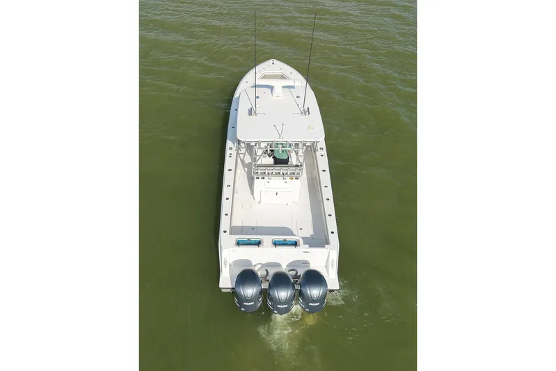  Yacht Photos Pics Aerial view of 2017 Contender 39 ST boat with triple outboard engines.