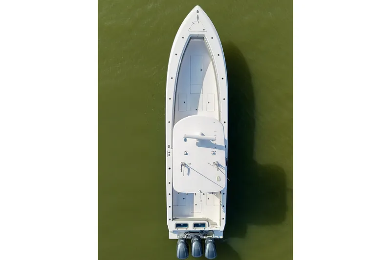  Yacht Photos Pics Top view of a 2017 Contender 39 ST boat on green water.