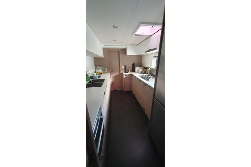 Yacht Photos Pics Modern kitchen interior of 2023 Fountaine Pajot Samana 59 yacht.