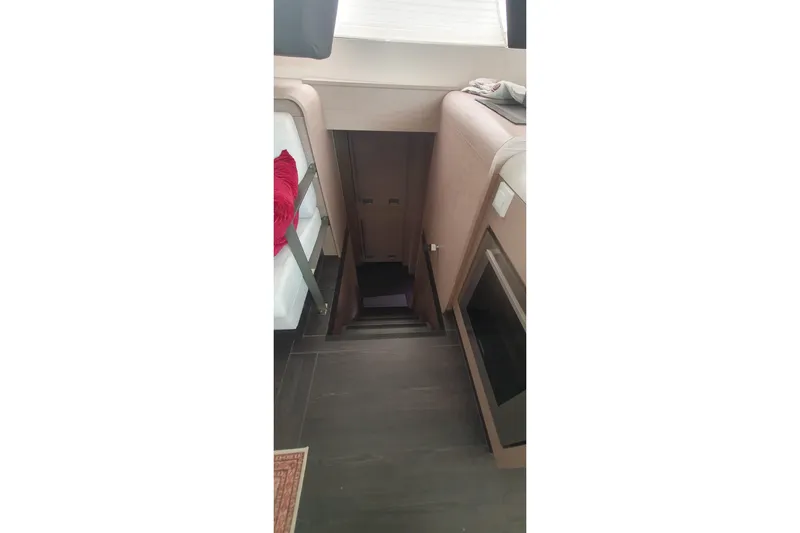  Yacht Photos Pics Interior stairs of 2023 Fountaine Pajot Samana 59 yacht, featuring modern design.