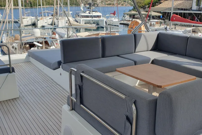  Yacht Photos Pics Luxurious 2023 Fountaine Pajot Samana 59 yacht with spacious outdoor seating area.