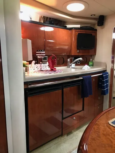  Yacht Photos Pics Interior of 2004 Sea Ray 360 Sundancer featuring elegant kitchen.