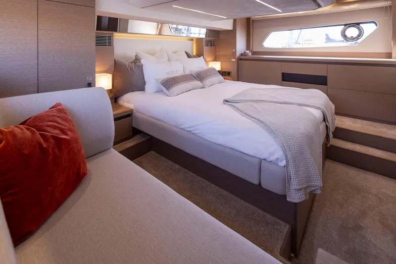 Four At Sea Yacht Photos Pics Luxurious bedroom interior of 2019 Prestige 460 yacht with modern design and cozy bedding.