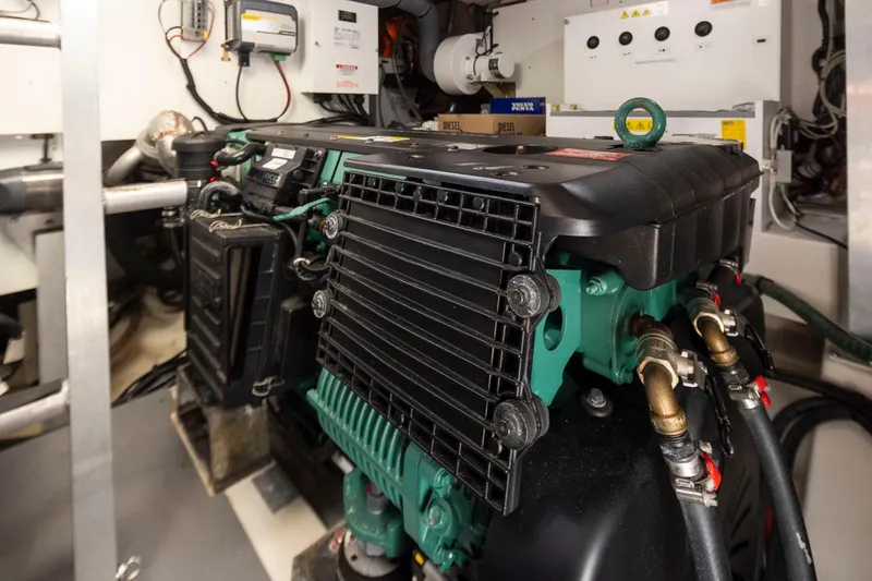 Four At Sea Yacht Photos Pics Engine room of a 2019 Prestige 460 yacht, featuring a Volvo Penta engine.