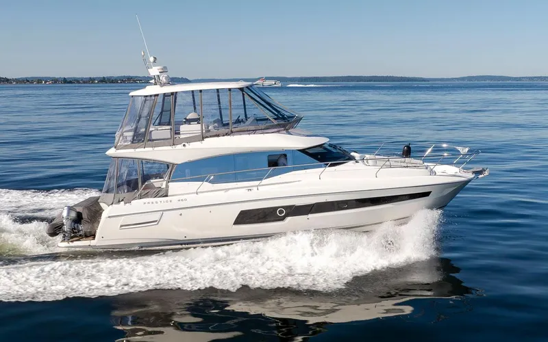 Four At Sea Yacht Photos Pics 2019 Prestige 460 yacht cruising on calm blue waters.