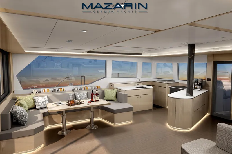 Iyacht / E-motion Italy Yacht Photos Pics Luxurious interior of 2025 Mazarin 55 Sail Cat with modern kitchen and seating area.