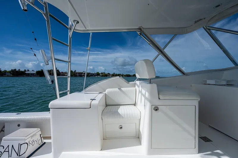  Yacht Photos Pics 2006 Topaz 32 Express boat interior with white seating and ocean view.