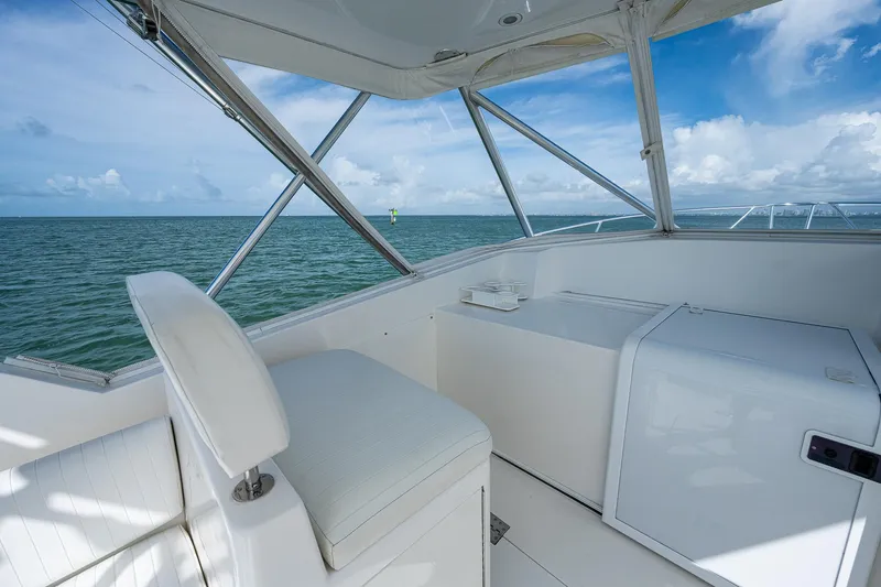  Yacht Photos Pics Interior view of 2006 Topaz 32 Express boat with ocean backdrop.