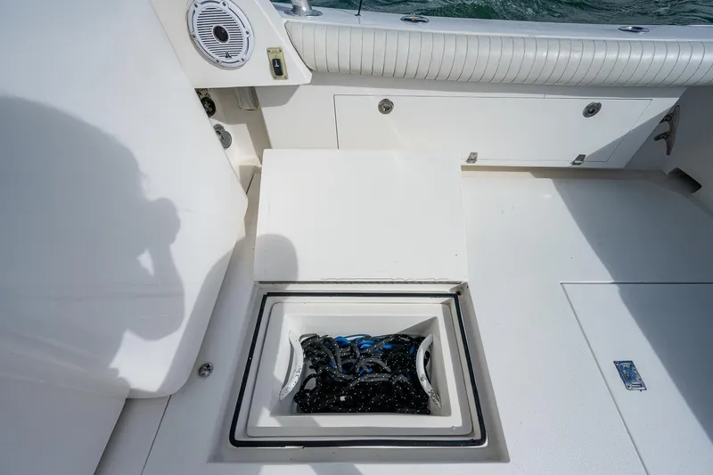  Yacht Photos Pics Open storage compartment on a 2006 Topaz 32 Express boat.