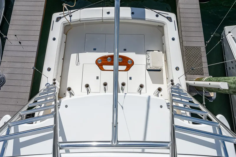  Yacht Photos Pics Top view of 2006 Topaz 32 Express boat docked at marina.