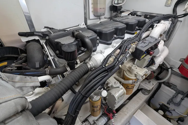 Casa Amigos Yacht Photos Pics Engine room of a 2010 Fairline Squadron yacht, showcasing detailed machinery components.