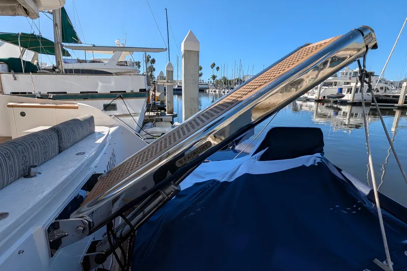 Casa Amigos Yacht Photos Pics 2010 Fairline Squadron yacht with gangway at marina, clear blue sky.