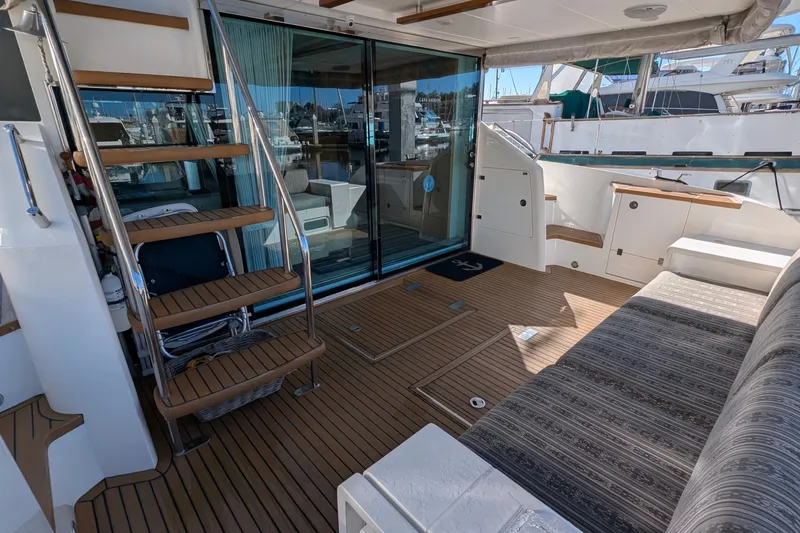Casa Amigos Yacht Photos Pics 2010 Fairline Squadron yacht deck with wooden flooring and modern seating.