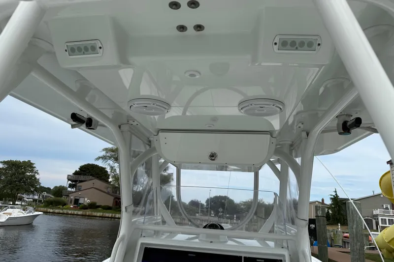  Yacht Photos Pics 2015 Yellowfin 32 boat interior with modern electronics and speakers.