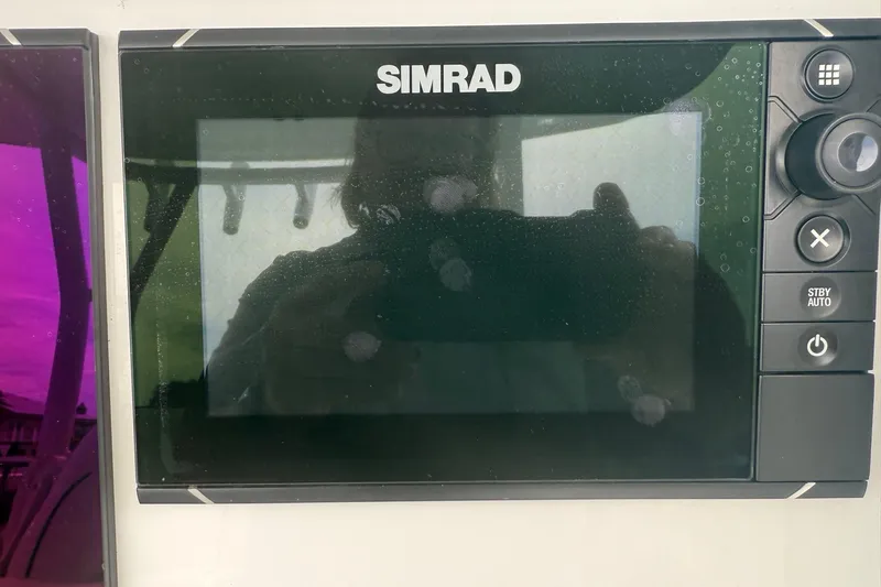  Yacht Photos Pics Simrad marine display on 2015 Yellowfin 32 boat dashboard.