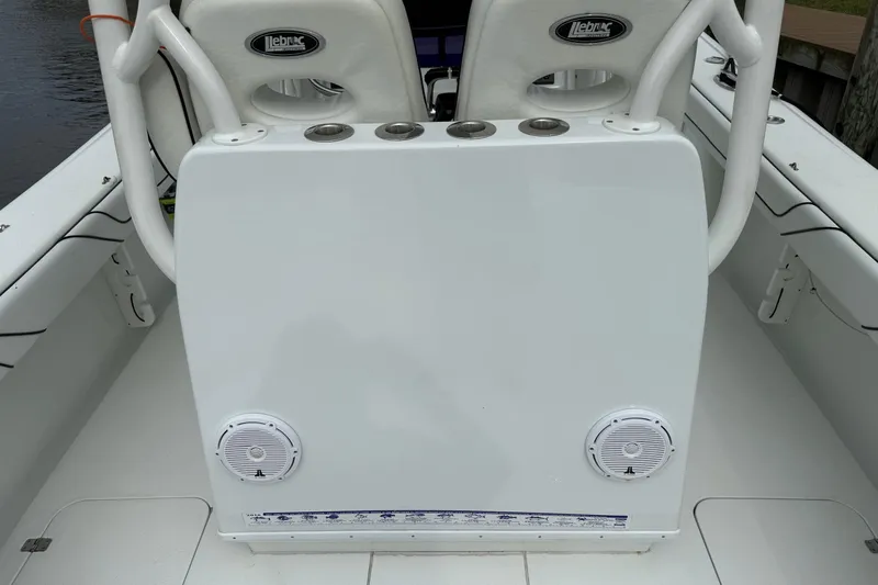  Yacht Photos Pics 2015 Yellowfin 32 boat interior with dual seats and speakers.