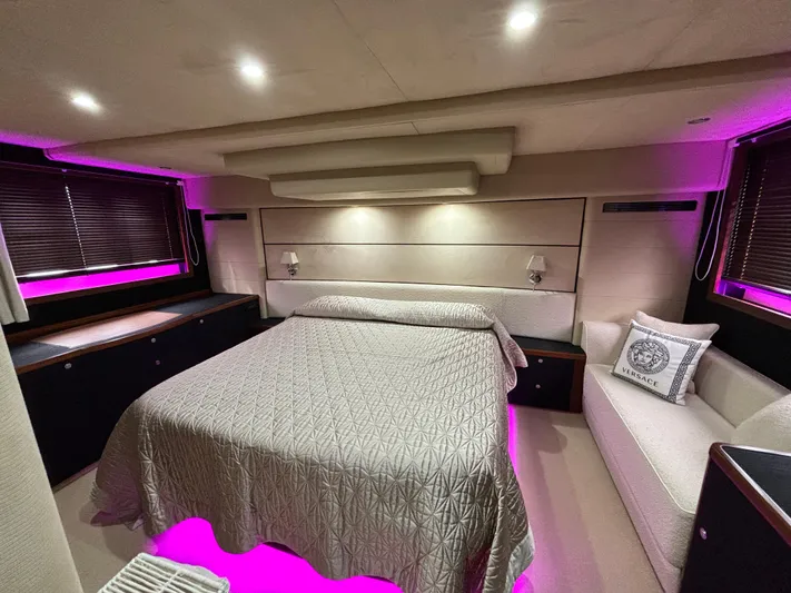  Yacht Photos Pics Luxurious bedroom in 2010 Princess 62 Flybridge yacht with ambient pink lighting.